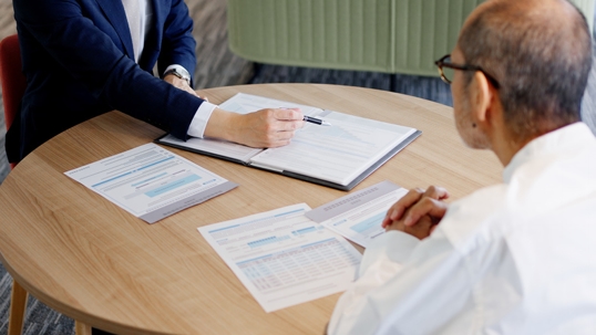 lawyer helping businessman with taxes